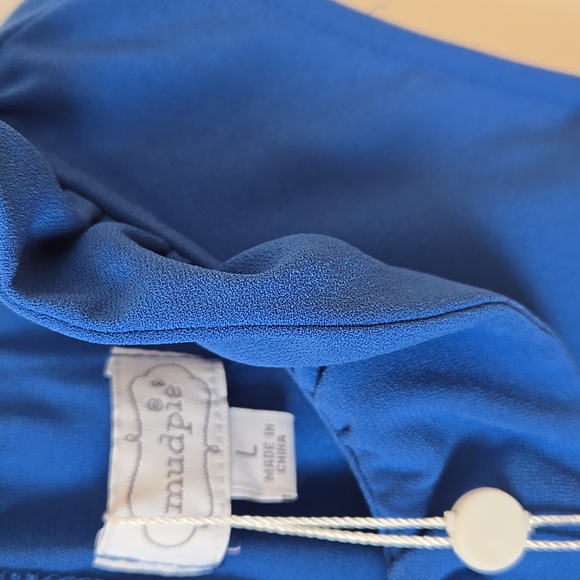 2/$10 Blue Sleeveless Eloise Ruffle Bow Top - Picture 2 of 8